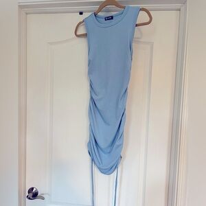 Light blue bodycon tie dress.